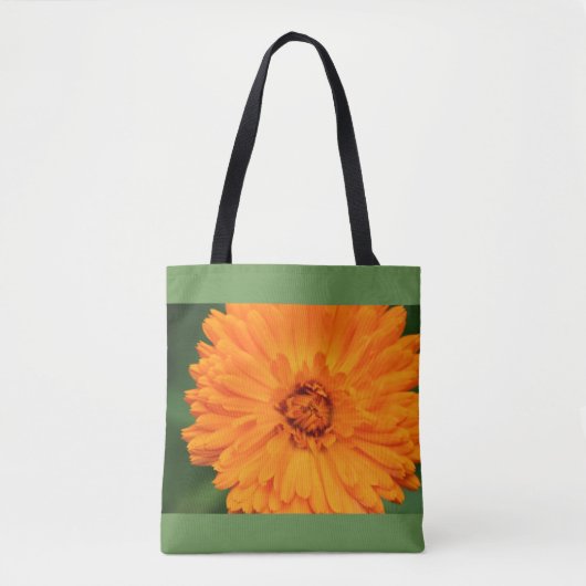 Orange und grüne Tasche der wild lebenden Blume (Vorderseite)