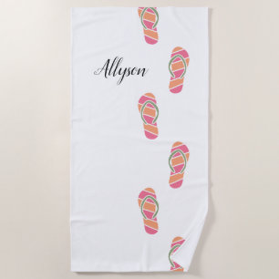 Orange- und rosa Flip-Flops, schwarzer Schriftname Strandtuch