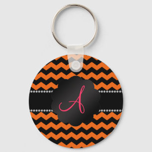 Orange und schwarze Sparren des Monogramms Schlüsselanhänger