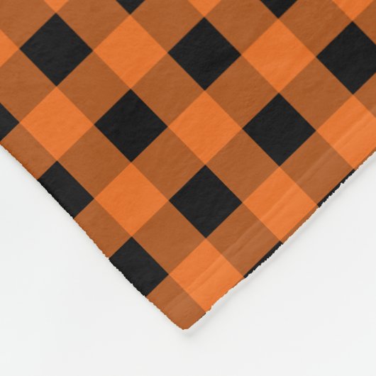 Orange und schwarzer Gingham überprüftes Muster Fleecedecke (Ecke)