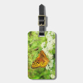 Orange und schwarzer Schmetterling mit weißen Gepäckanhänger (Vorderseite vertikal)