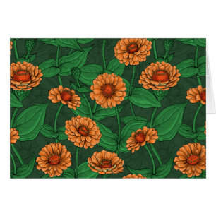 Orange Zinnia Blume, grüne Blätter auf dunkelgrün