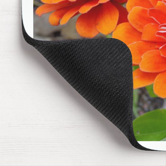 Orange Zinnia-Blumen Mousepad (Ecke)