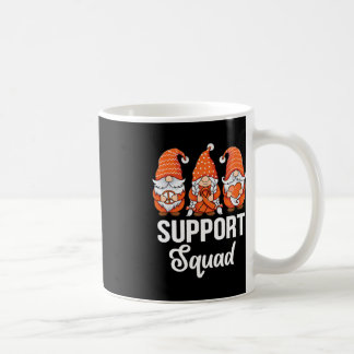 Orangefarbene Bänder unterstützen Überlebende von Kaffeetasse