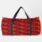 Orangefarbene Blätter der Silhouette auf rot Duffle Bag (Rückseite)