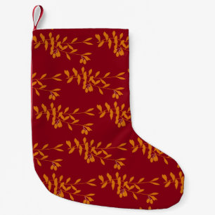Orangefarbene Blätter der Silhouette auf rot Kleiner Weihnachtsstrumpf
