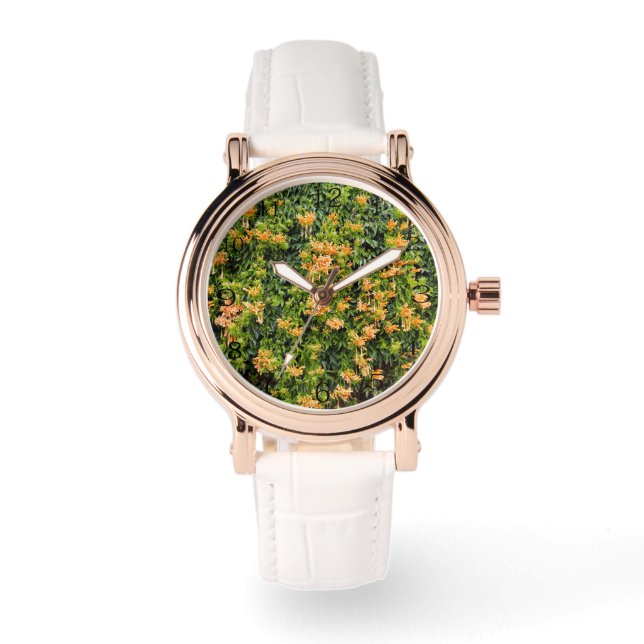 Orangefarbene Blume an einer Mauer, Armbanduhr (Vorderseite)