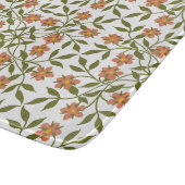 Orangefarbene Blume, Blumenmuster, Grünpflanzen, B Schneidebrett (Ecke)