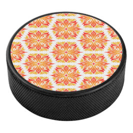 Orangefarbene Blume, Muster von Blume, Muster von  Eishockey Puck