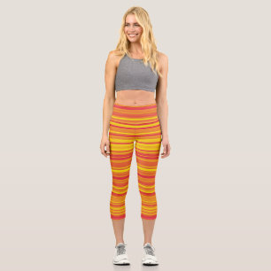 Orangefarbene, gelbe Streifen Capri Leggings