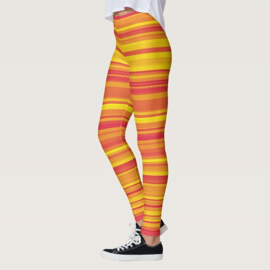 Orangefarbene, gelbe Streifen Leggings (Links)
