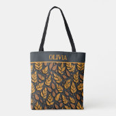 Orangefarbene Herbstblätter auf braunem Hintergrun Tasche (Rückseite)