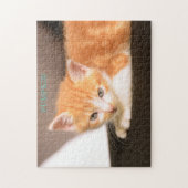 Orangefarbene Katze auf schwarzottoman/Orange Kitt Puzzle (Vertikal)