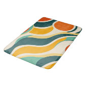 Orangefarbene Kreise und Farbstreifen Badematte (Schrägansicht)