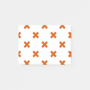 Orangefarbene Kreuzstiche auf weiß Post-it Klebezettel