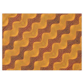 Orangefarbene Kurve und goldene Punkte auf braunem Tischdecke (Vorderseite (Horizontal))