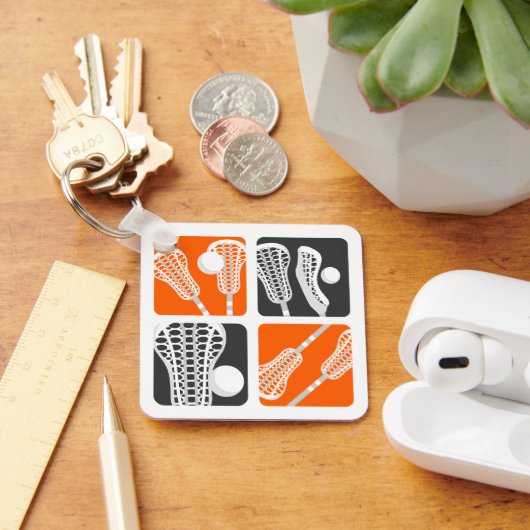 Orangefarbene Lacrosse Blöcke Schlüsselanhänger (Schreibtisch)