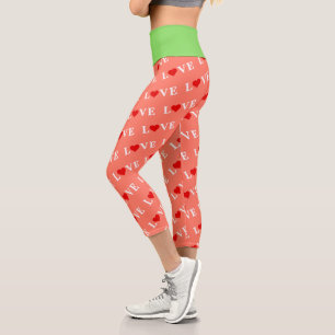 Orangefarbene LIEBE und rotes Herzdesign Elegante Capri Leggings