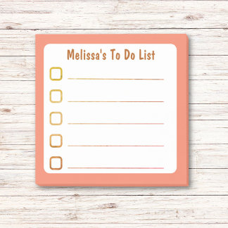 Orangefarbene Liste Post-it Klebezettel