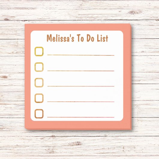 Orangefarbene Liste Post-it Klebezettel