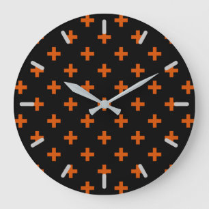 Orangefarbene Polka-Kreuze auf schwarz Große Wanduhr