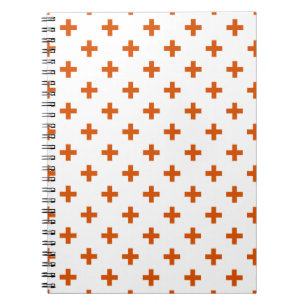 Orangefarbene Polka-Kreuze auf weiß Notizblock