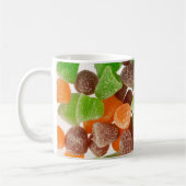 Orangefarbene rote Kaugummi mit Zucker bestreut Kaffeetasse (Links)