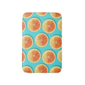 Orangefarbene Scheiben auf blau Badematte (Vorderseite Vertikal)