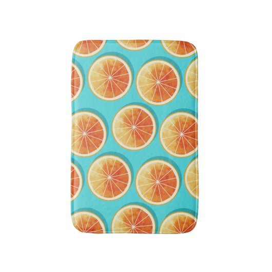 Orangefarbene Scheiben auf blau Badematte (Vorderseite Vertikal)