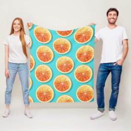 Orangefarbene Scheiben auf blau Fleecedecke