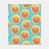 Orangefarbene Scheiben auf blau Fleecedecke (Vorderseite)