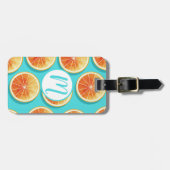 Orangefarbene Scheiben auf blau Gepäckanhänger (Vorderseite horizontal)