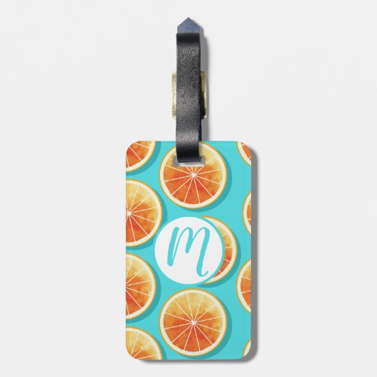 Orangefarbene Scheiben auf blau Gepäckanhänger (Rückseite vertikal)