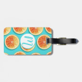 Orangefarbene Scheiben auf blau Gepäckanhänger (Rückseite horizontal)