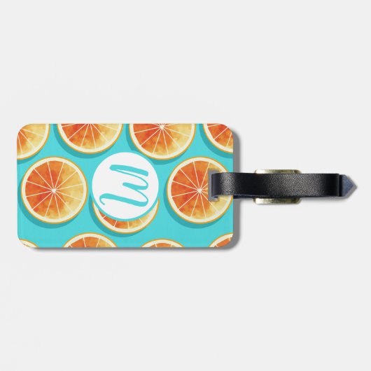 Orangefarbene Scheiben auf blau Gepäckanhänger (Rückseite horizontal)