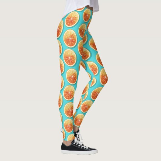 Orangefarbene Scheiben auf blau Leggings (Rechts)