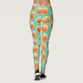 Orangefarbene Scheiben auf blau Leggings (Rückseite)
