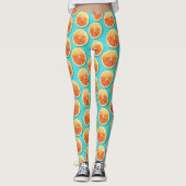Orangefarbene Scheiben auf blau Leggings (Vorderseite)