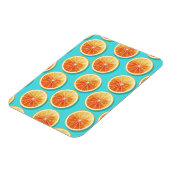 Orangefarbene Scheiben auf blau Magnet (Linke Seite)