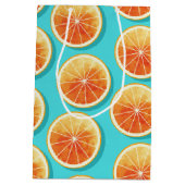 Orangefarbene Scheiben auf blau Mittlere Geschenktüte (Rückseite)