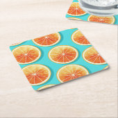 Orangefarbene Scheiben auf blau Rechteckiger Pappuntersetzer (angewinkelt)