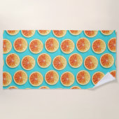 Orangefarbene Scheiben auf blau Strandtuch (Vorderseite)