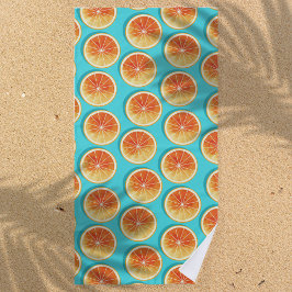 Orangefarbene Scheiben auf blau Strandtuch