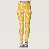 Orangefarbene Schnittmuster Leggings (Vorderseite)