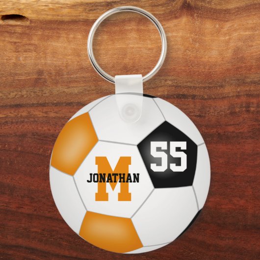 Orangefarbene schwarze Mannschaft Farben Jungs Mäd Schlüsselanhänger (Rückseite)