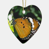 Orangefarbene, schwarze und weiße Schmetterlinge a Keramikornament (Links)