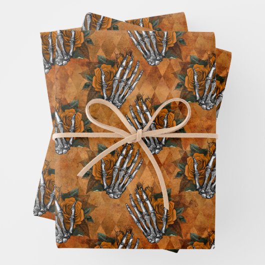Orangefarbene Skeletthandschuhe auf Orange Geschenkpapier Set (Beispiel)