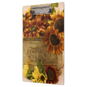 Orangefarbene Sonnenblumen im Körbchen Klemmbrett (Links)