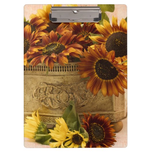 Orangefarbene Sonnenblumen im Körbchen Klemmbrett (Vorderseite)