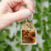 Orangefarbene Sonnenblumen im Körbchen Schlüsselanhänger (Hand)